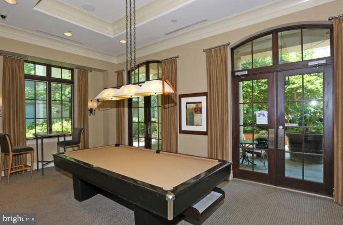 11710 Old Georgetown Road, Unit 422 North Bethesda, MD 20852 - Photo 25 of 29 a room with pool table and windows