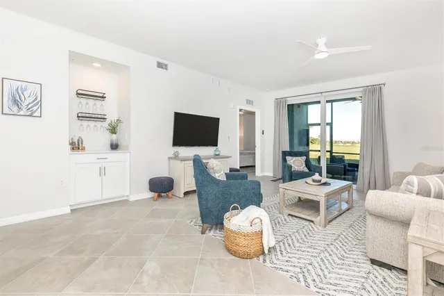 a view of a bathroom with a shower and a sink