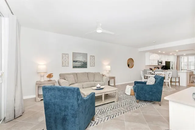 a bathroom with a toilet sink vanity and mirror