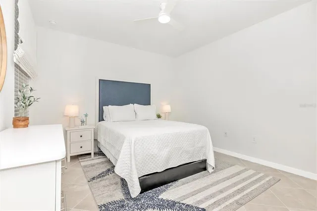 a view of a room with gym equipment and a large window