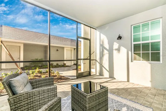 a kitchen with a sink cabinets and stainless steel appliances