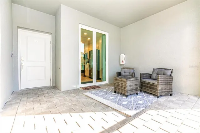 a kitchen with stainless steel appliances a refrigerator sink and microwave