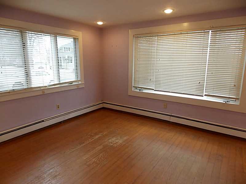 338 9th Avenue Woonsocket, RI 02895 - Photo 4 of 19 Living Room.
