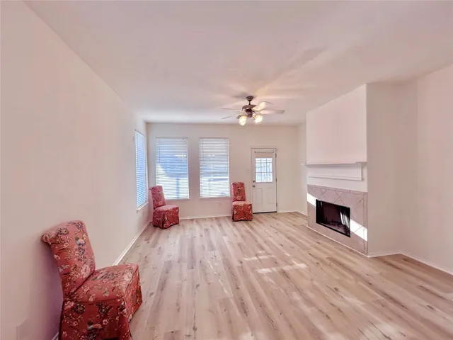 a bedroom with a bed and a fireplace
