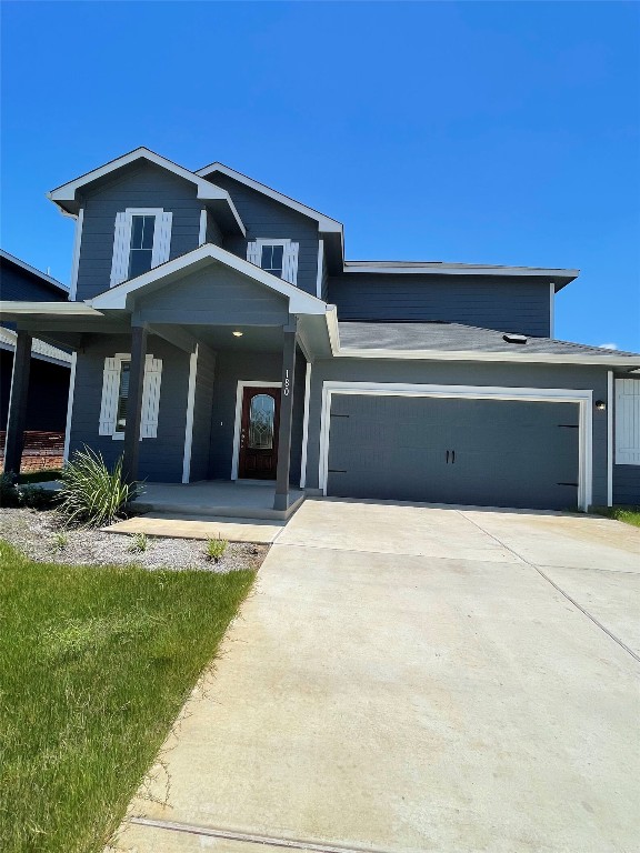 180 Olympic Pk Drive Kyle, TX 78640 - Photo 1 of 1 a front view of a house with a yard