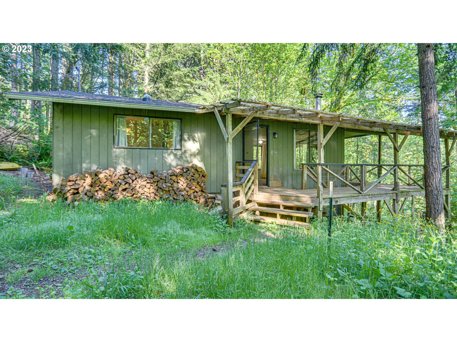 19830 South Hinkle Road Oregon City, OR 97045 - Photo 12 of 47 a view of a backyard with a garden