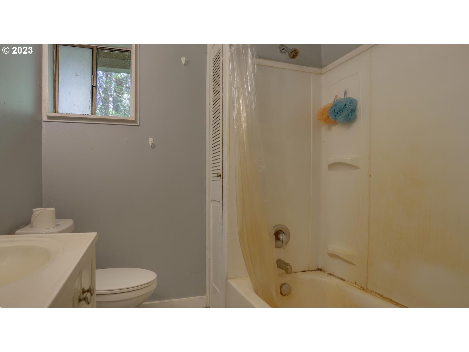 19830 South Hinkle Road Oregon City, OR 97045 - Photo 16 of 47 a bathroom with a toilet a sink and mirror