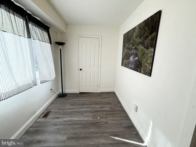 a view of a hallway with stairs