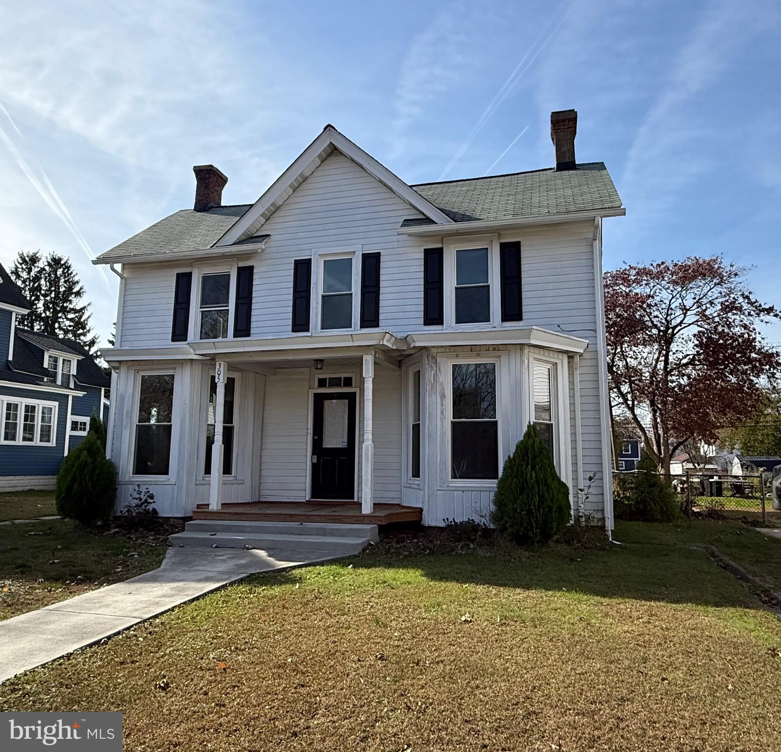 305 Central Avenue Ridgely, MD 21660 - Photo 2 of 19 a front view of a house with a yard