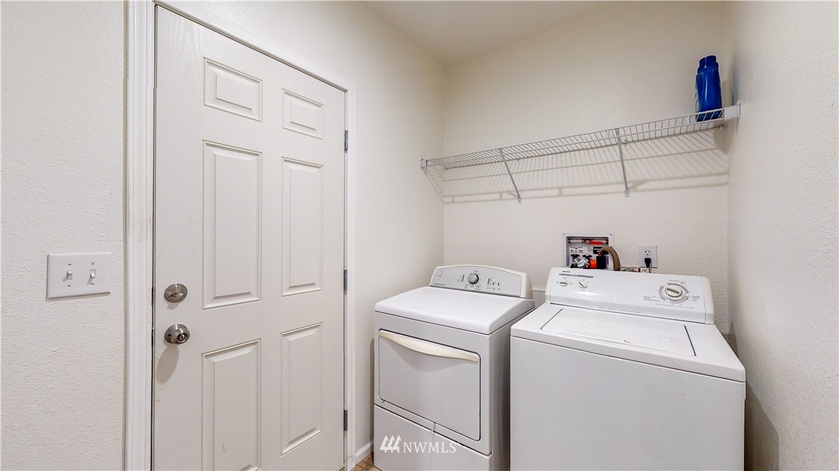 729 Cinebar Road, Unit A Cinebar, WA 98533 - Photo 11 of 30 a utility room with dryer and washer
