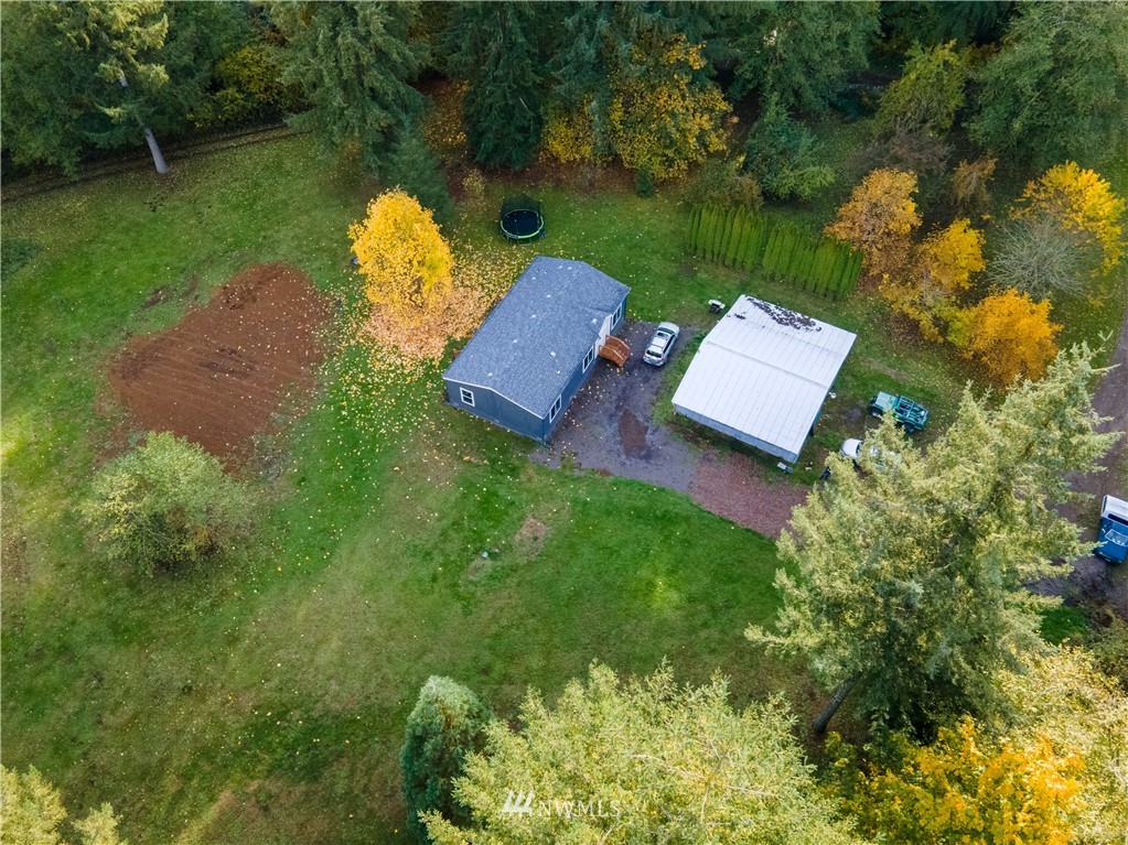729 Cinebar Road, Unit A Cinebar, WA 98533 - Photo 30 of 30 an aerial view of a house with garden space lake view and mountain view in back