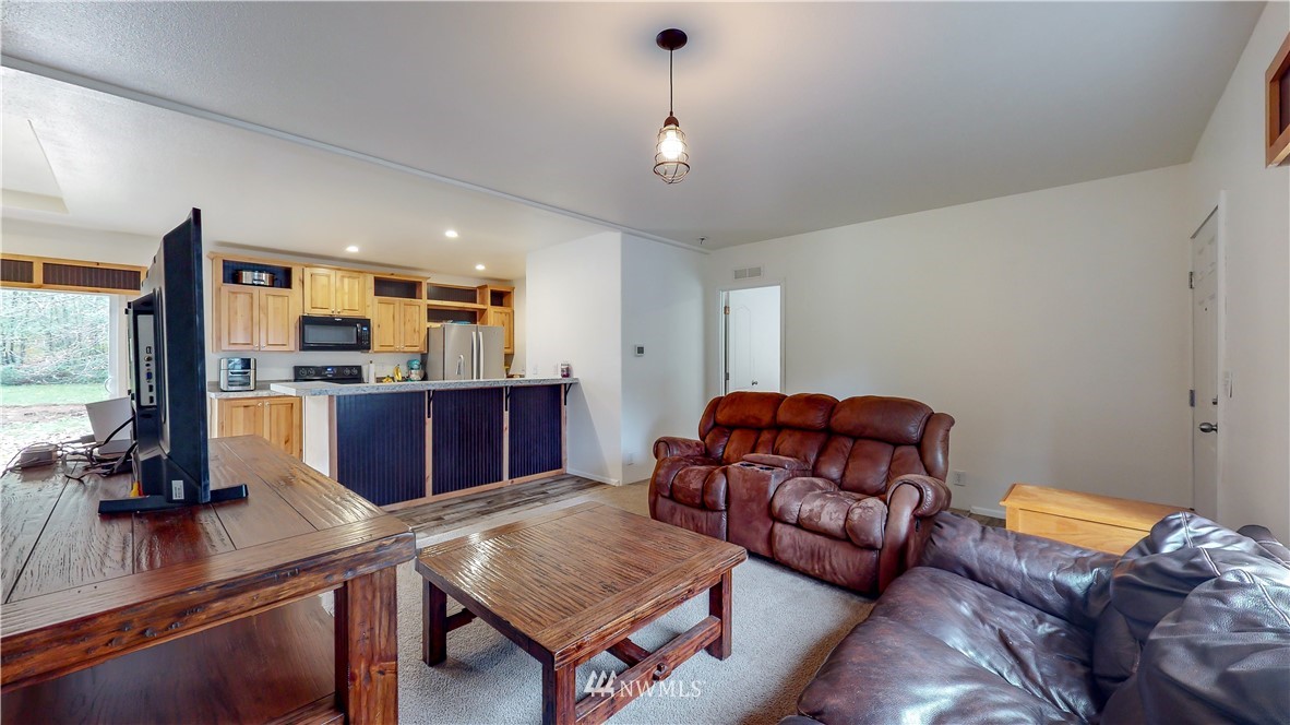 729 Cinebar Road, Unit A Cinebar, WA 98533 - Photo 4 of 30 a living room with furniture