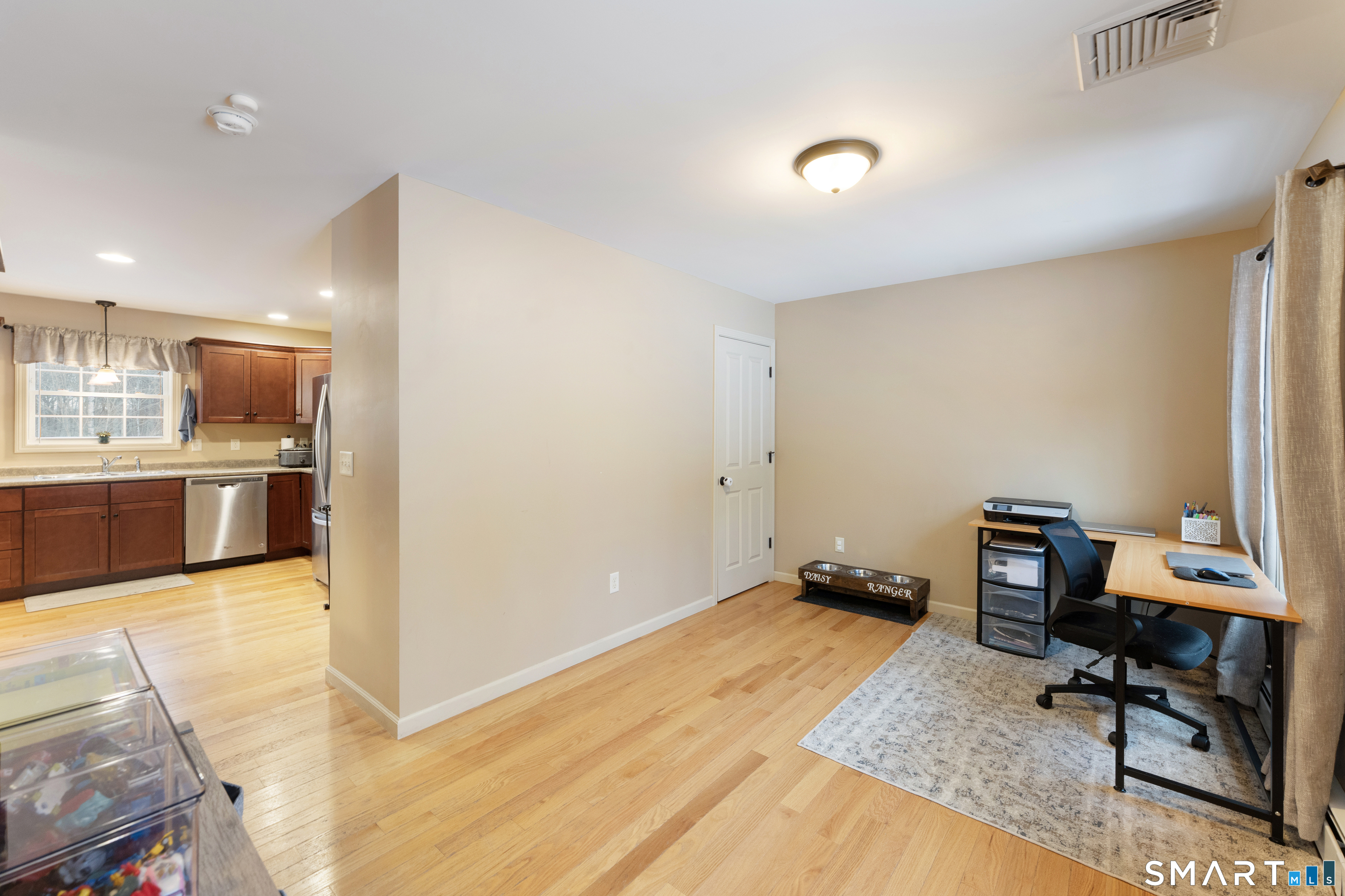 43 Tatnic Hill Road Brooklyn, CT 06234 - Photo 4 of 25 a workspace with furniture and view of kitchen