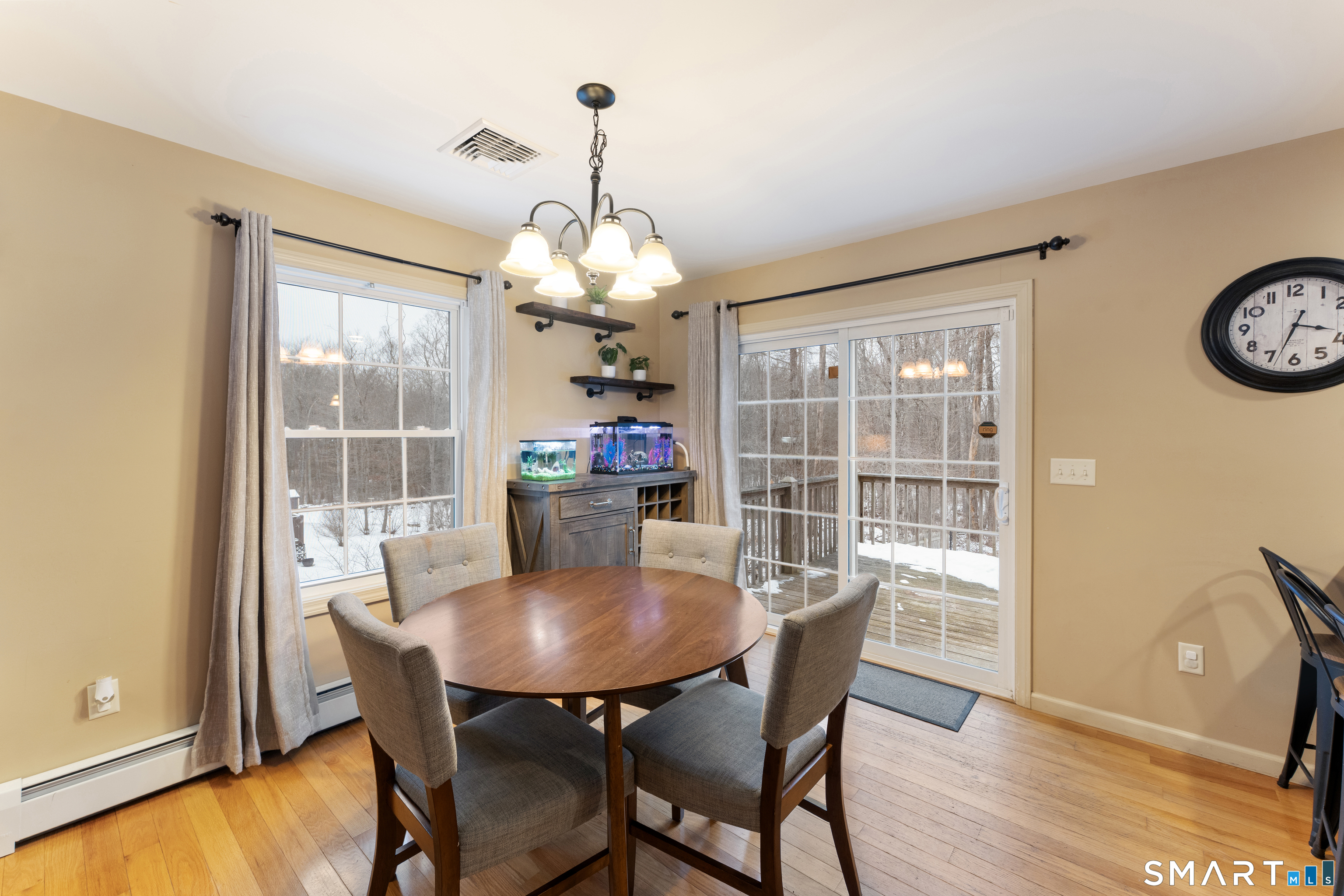 43 Tatnic Hill Road Brooklyn, CT 06234 - Photo 7 of 25 a view of a dining room with furniture window and wooden floor