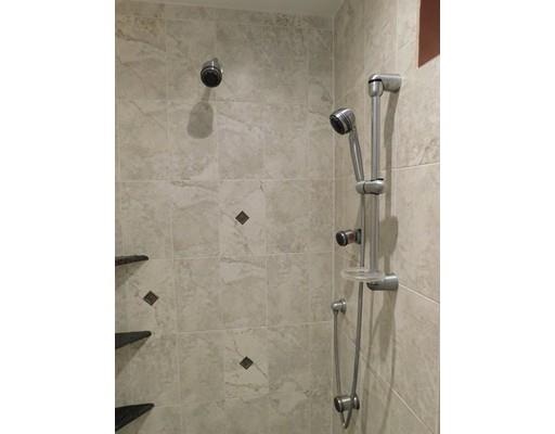 23 Rangeway Road Billerica, MA 01862 - Photo 11 of 30 a bathroom with a shower