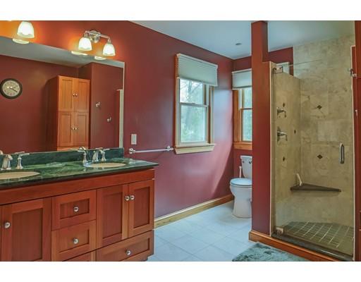 23 Rangeway Road Billerica, MA 01862 - Photo 10 of 30 a bathroom with a granite countertop sink a mirror and shower