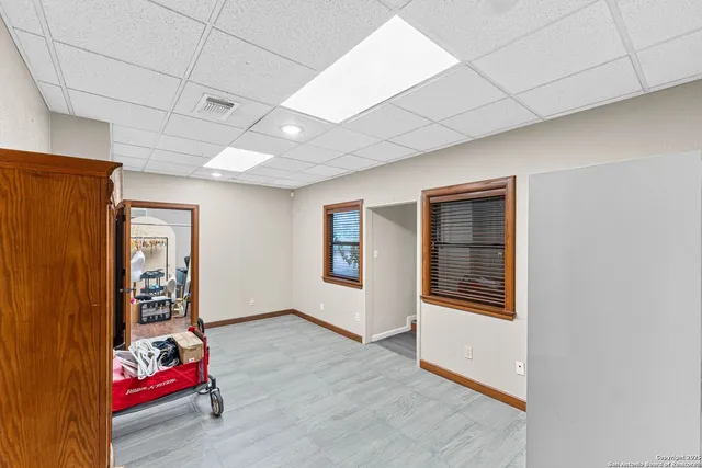 a kitchen with stainless steel appliances a sink and a refrigerator