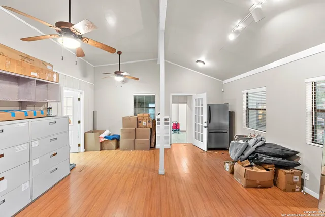 a outdoor space with furniture a rug and a window