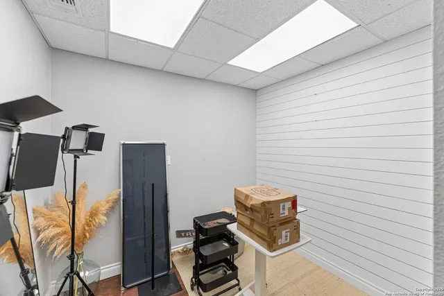 a view of the hall and a car garage