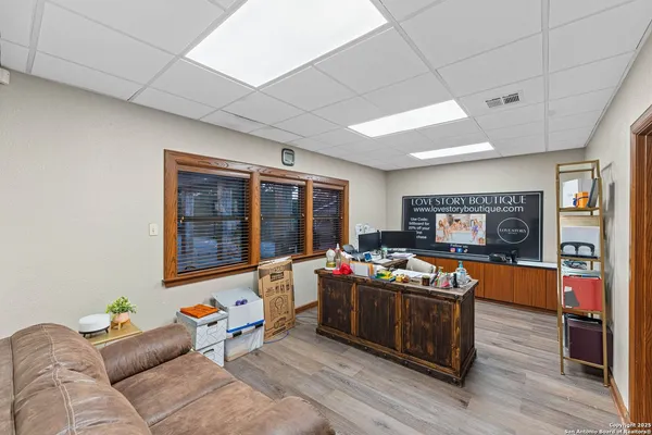 a view of a workspace with furniture