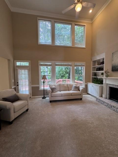 4055 Vista Point Lane Suwanee, GA 30024 - Photo 8 of 42 a living room with furniture and a fireplace