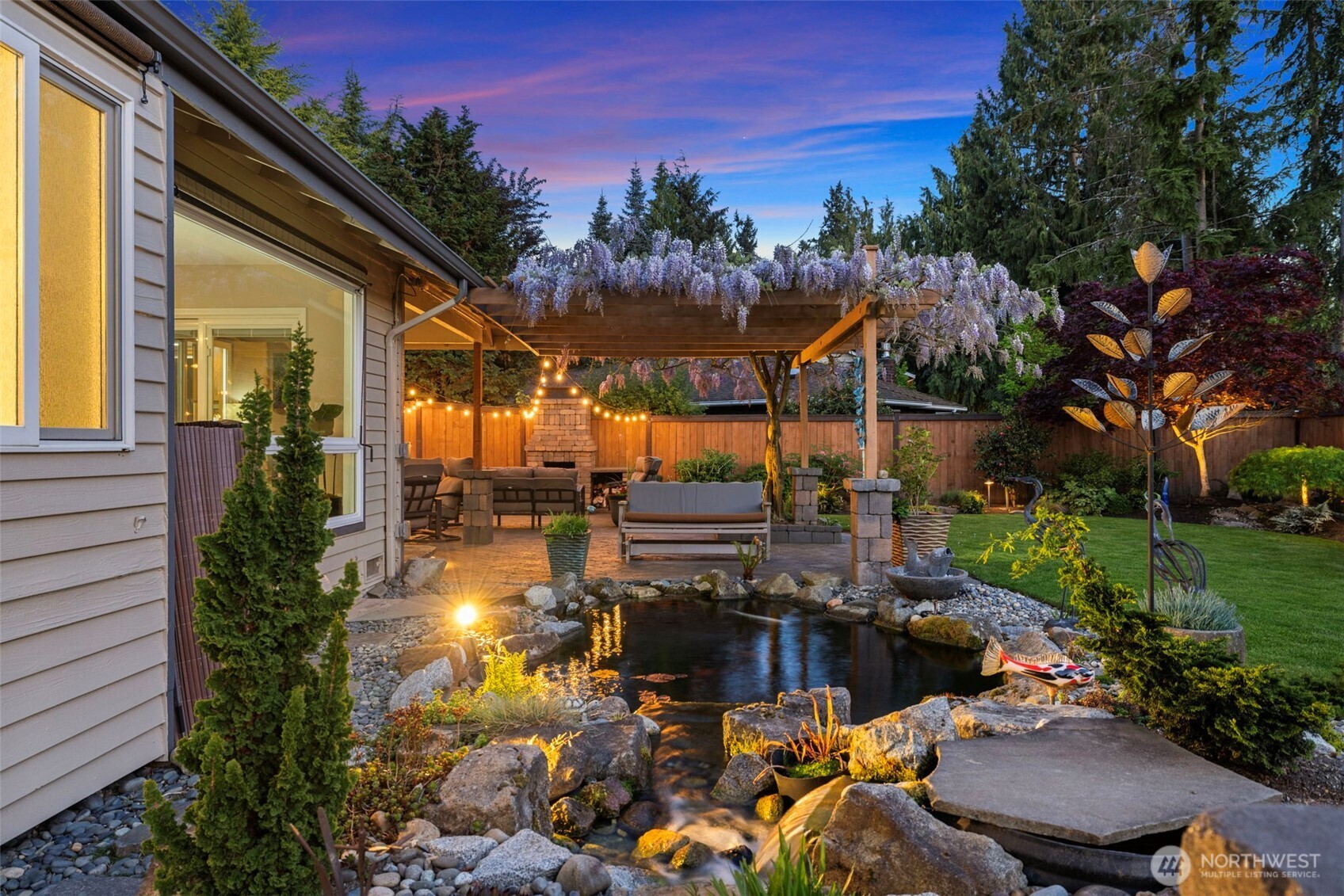 10900 39th Drive Southeast Everett, WA 98208 - Photo 32 of 39 a view of a patio with couches table and chairs and potted plants