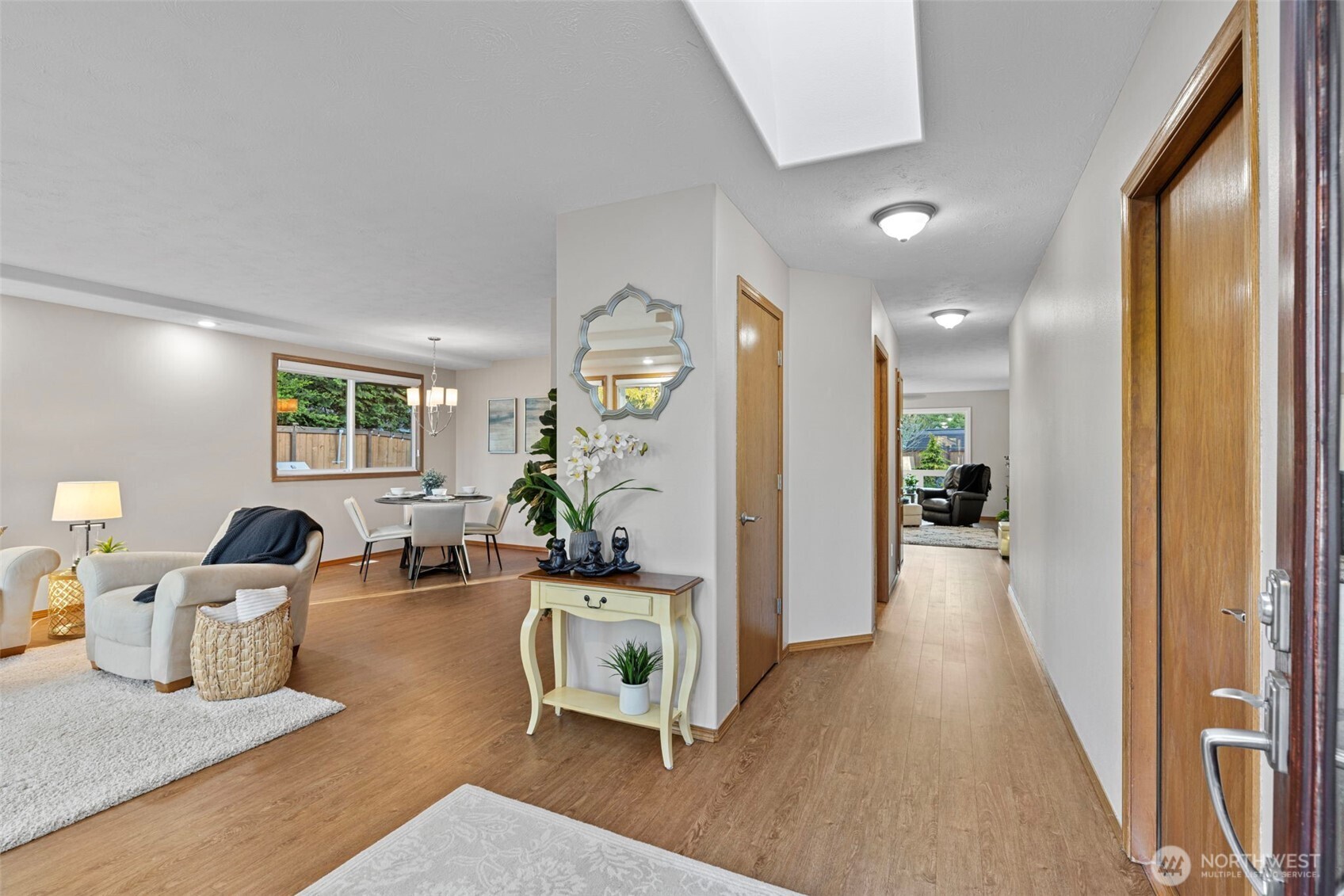 10900 39th Drive Southeast Everett, WA 98208 - Photo 5 of 39 a living room with furniture and a wooden floor