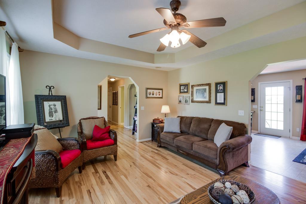 5004 Maple Springs Road Manchester, TN 37355 - Photo 15 of 22 a living room with furniture and wooden floor