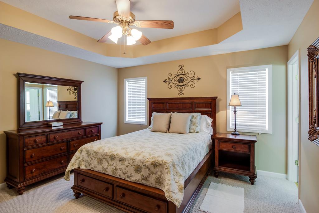 5004 Maple Springs Road Manchester, TN 37355 - Photo 19 of 22 a bedroom with a bed and a dresser