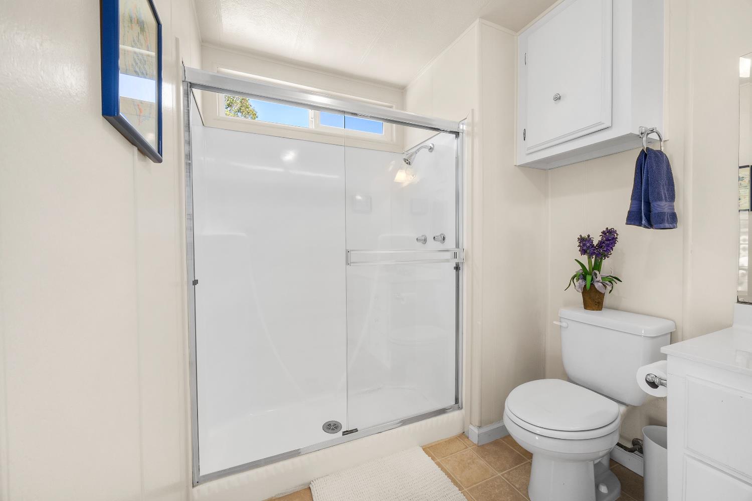 2435 Felt Street, Unit 24 Santa Cruz, CA 95062 - Photo 20 of 38 a bathroom with a toilet and a shower