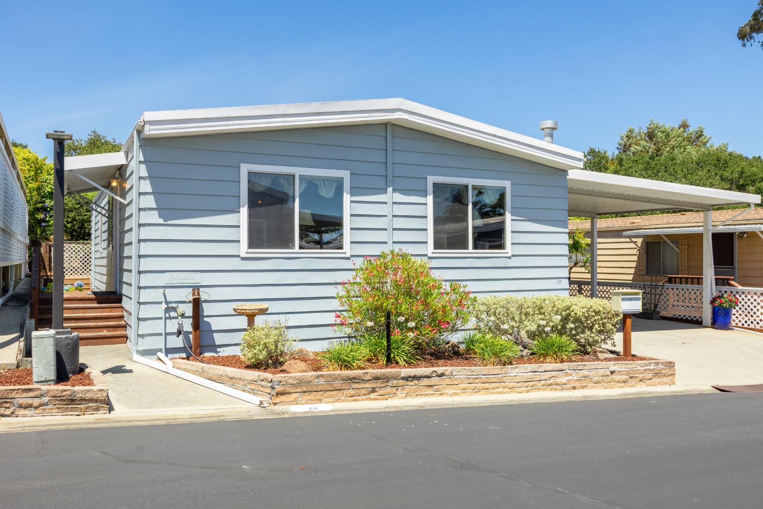2435 Felt Street, Unit 24 Santa Cruz, CA 95062 - Photo 2 of 38 a front view of a house with a yard