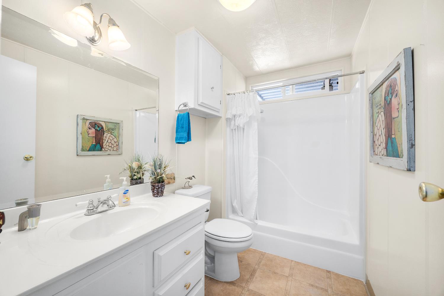 2435 Felt Street, Unit 24 Santa Cruz, CA 95062 - Photo 24 of 38 a bathroom with a sink a toilet and shower