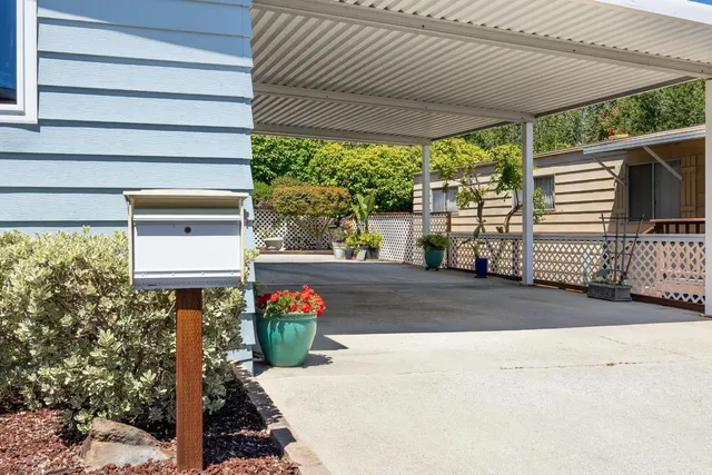 a view of a house with a street