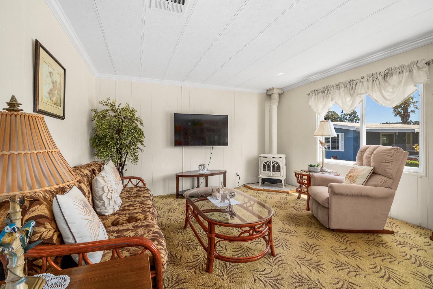 2435 Felt Street, Unit 24 Santa Cruz, CA 95062 - Photo 4 of 38 a living room with furniture and a flat screen tv