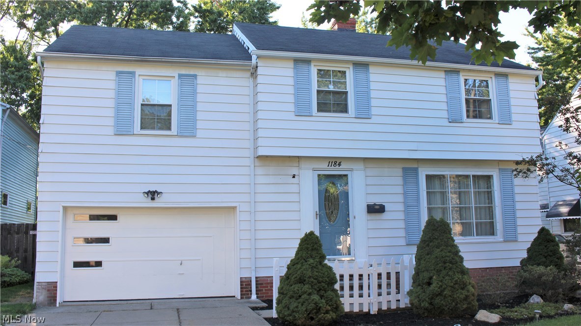 Front view of this charming colonial home.