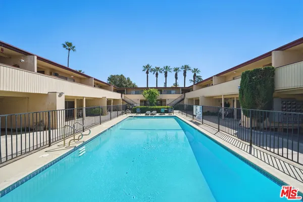 a view of a house with a swimming pool