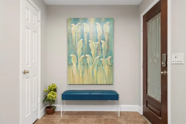a living room with a bathtub and a window