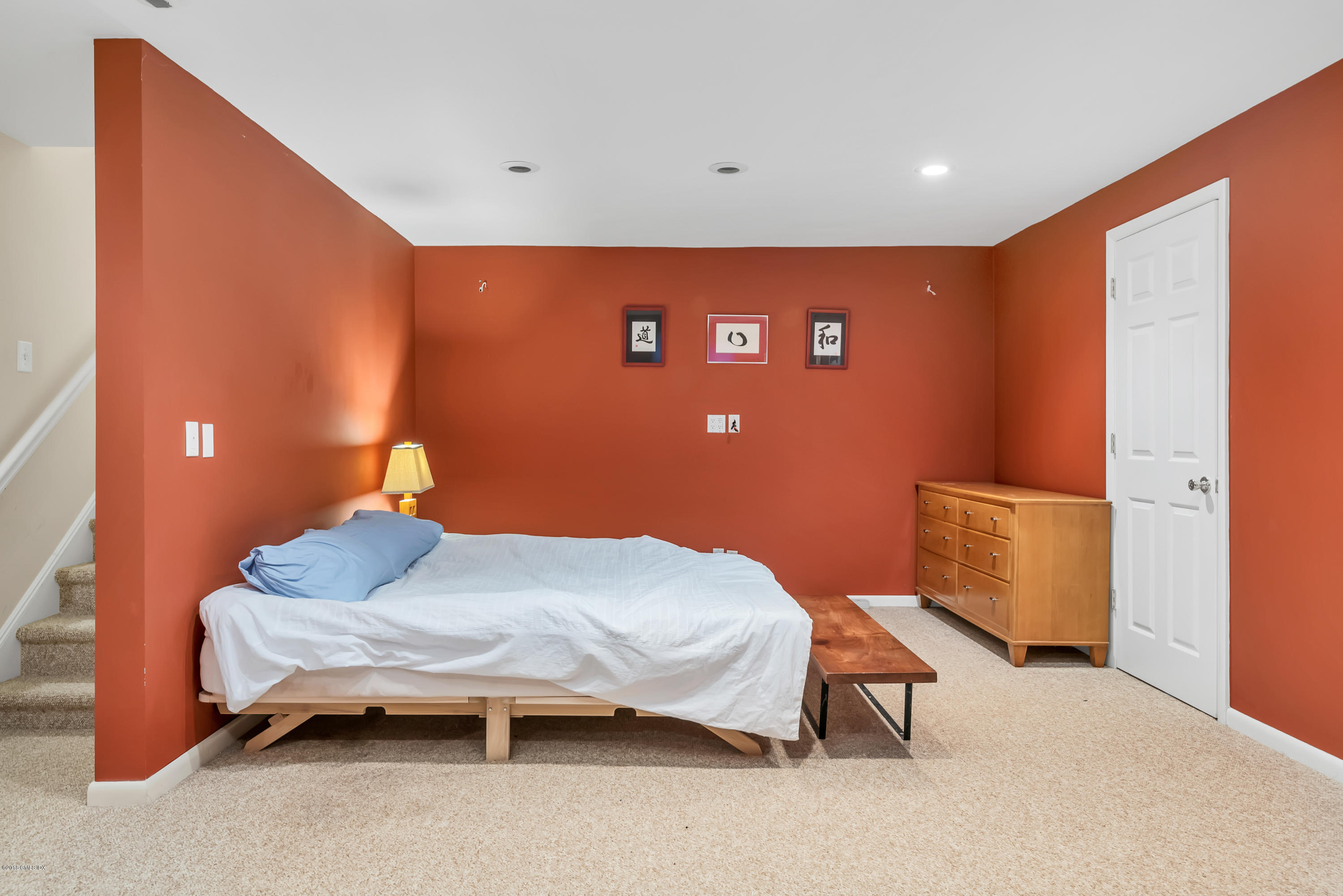 333 Palmer Hill Road, Unit 3D Riverside, CT 06878 - Photo 13 of 15 a bedroom with a bed and a night stand