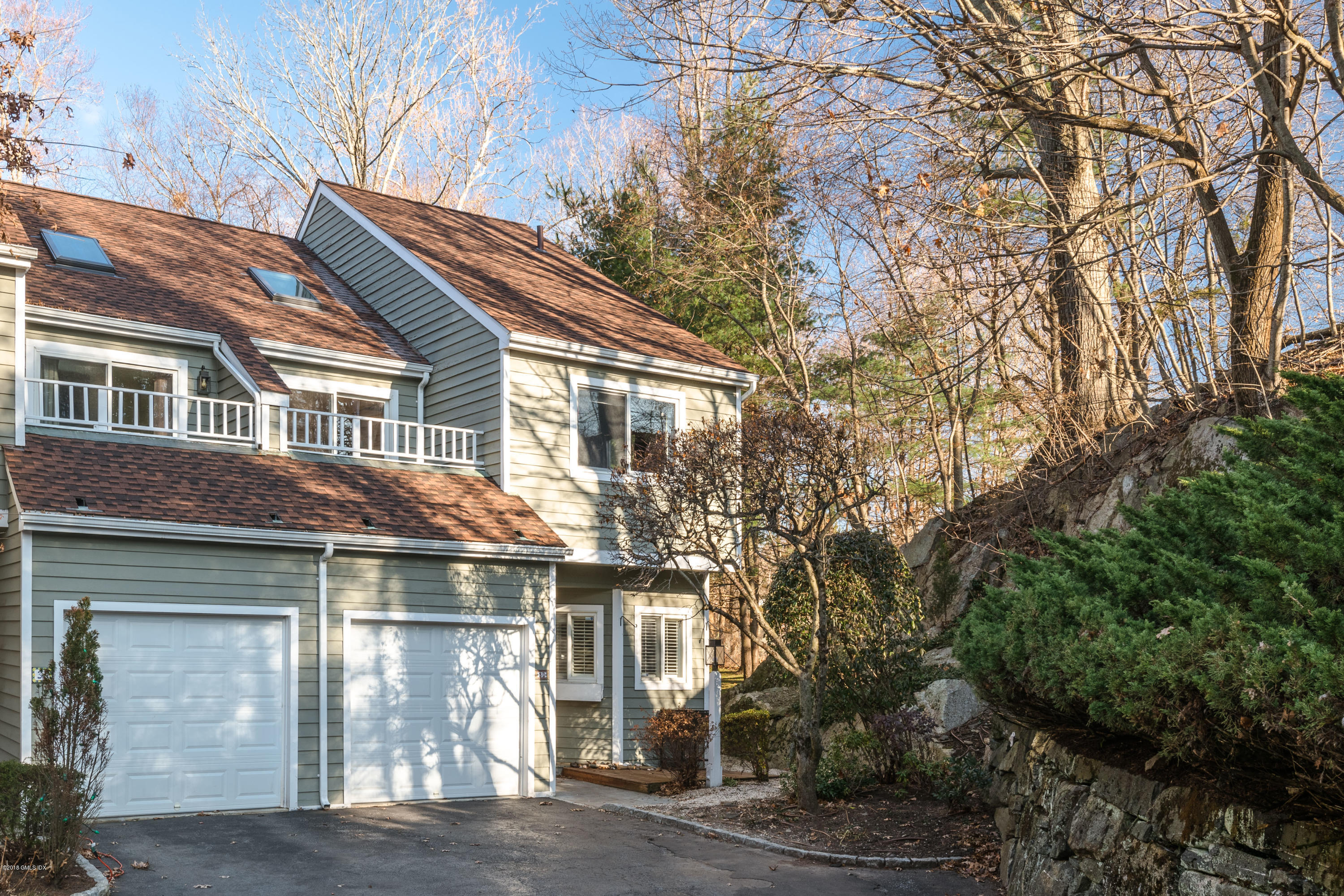 333 Palmer Hill Road, Unit 3D Riverside, CT 06878 - Photo 14 of 15 a front view of a house with a yard