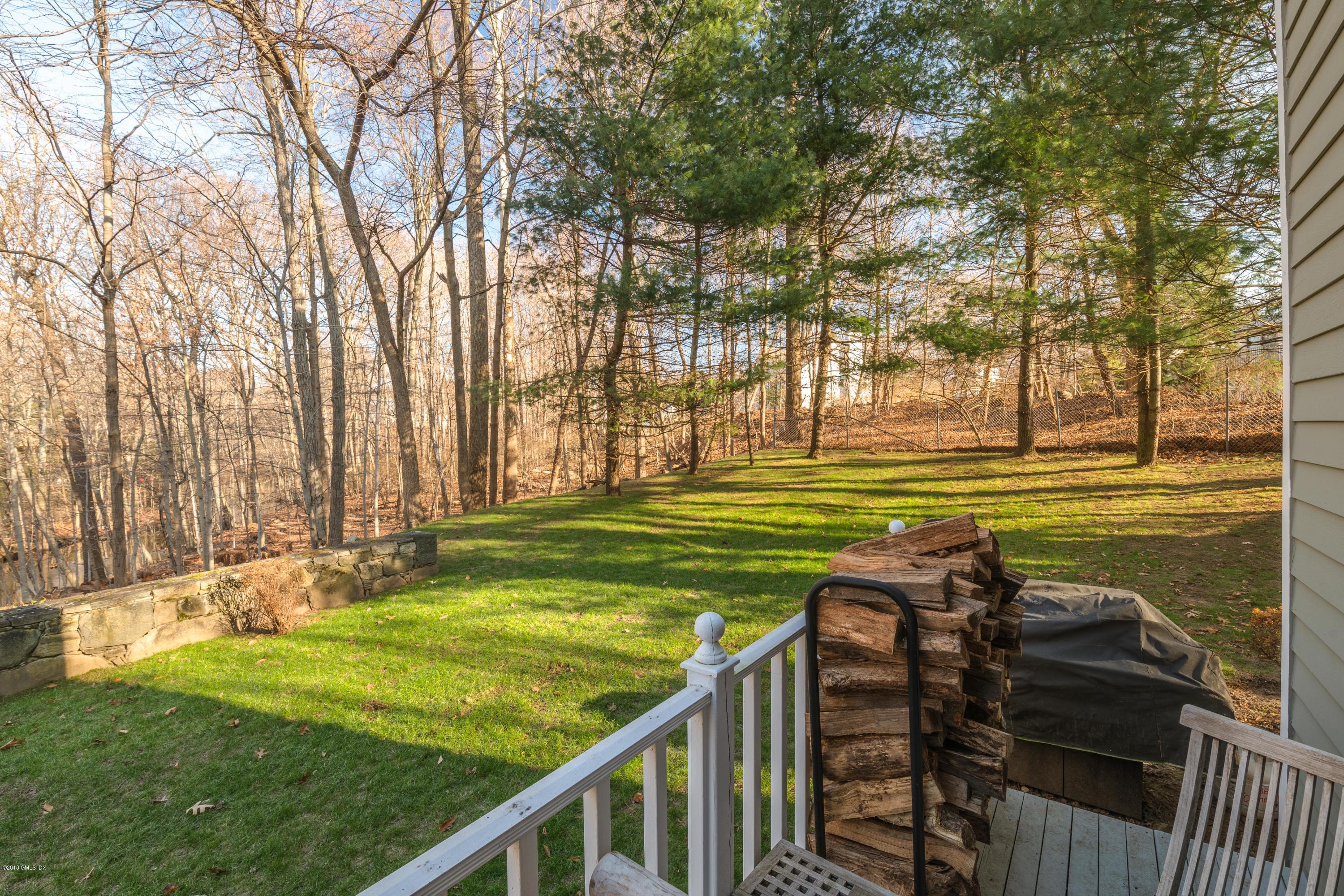 333 Palmer Hill Road, Unit 3D Riverside, CT 06878 - Photo 2 of 15 a view of a golf club with a backyard