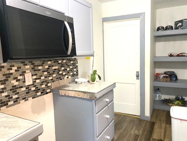 509 Ave I Sterling, IL 61081 - Photo 4 of 8 a bathroom with a sink and a mirror