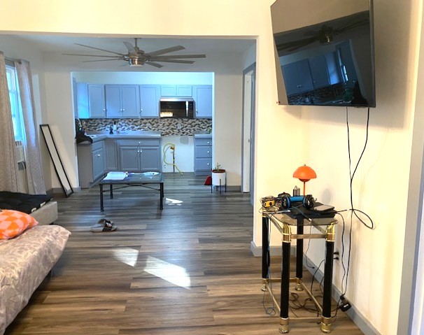 509 Ave I Sterling, IL 61081 - Photo 5 of 8 a view of living room with furniture and a flat screen tv