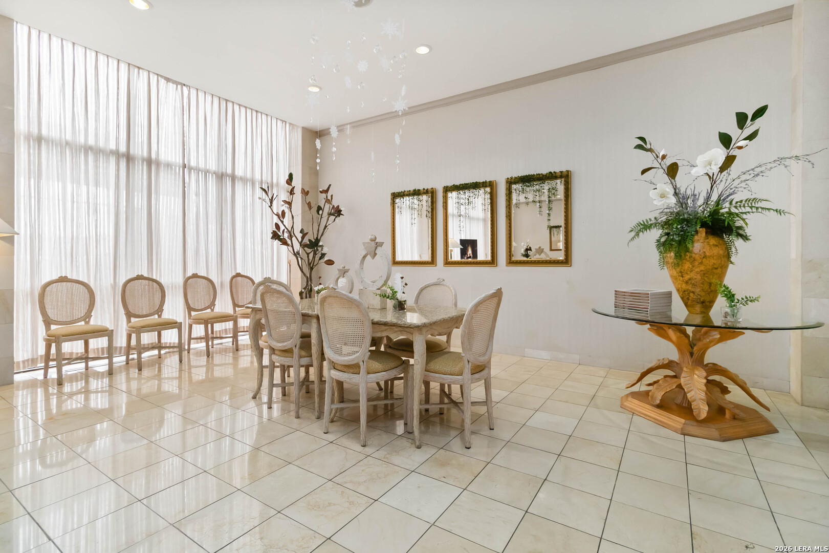 7701 Wurzbach Road, Unit 308 San Antonio, TX 78229 - Photo 12 of 17 a view of a dining room with furniture window and outside view