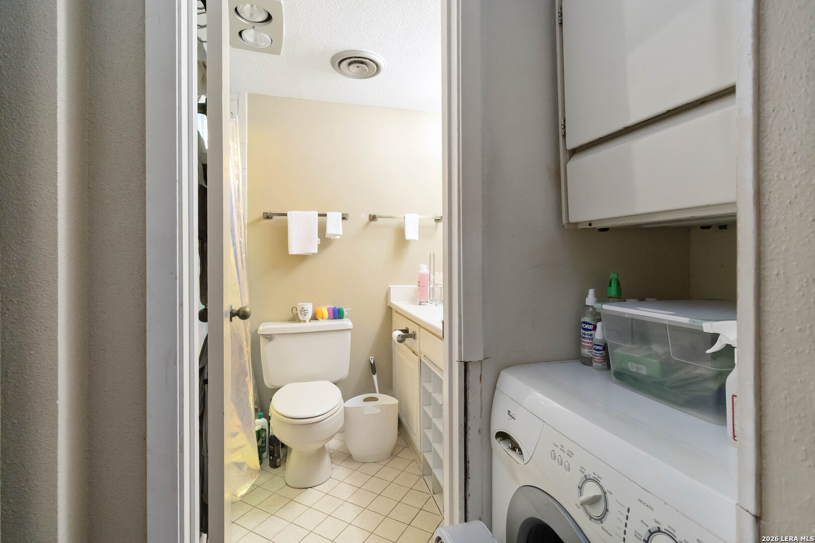 7701 Wurzbach Road, Unit 308 San Antonio, TX 78229 - Photo 7 of 17 a bathroom with a sink and a mirror