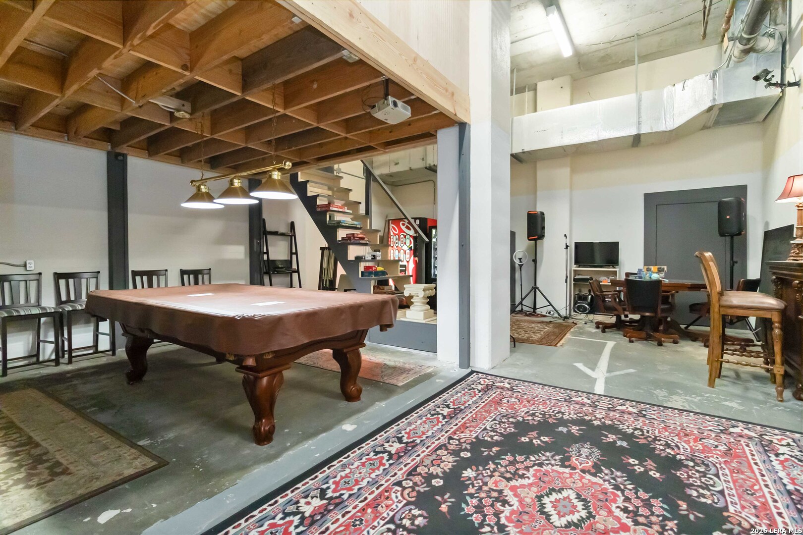 7701 Wurzbach Road, Unit 308 San Antonio, TX 78229 - Photo 8 of 17 a view of a dinning table and chairs in the patio