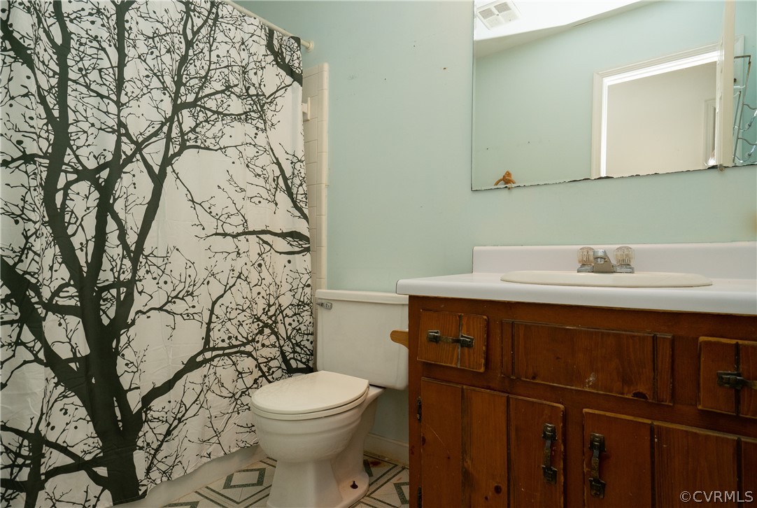 4624 Rabbit Foot Lane Chesterfield, VA 23236 - Photo 21 of 27 a bathroom with a sink and a toilet