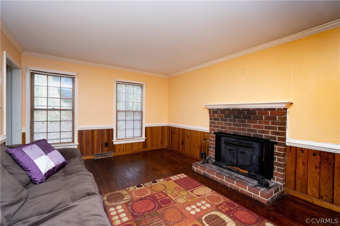 4624 Rabbit Foot Lane Chesterfield, VA 23236 - Photo 5 of 27 a living room with furniture and a fireplace
