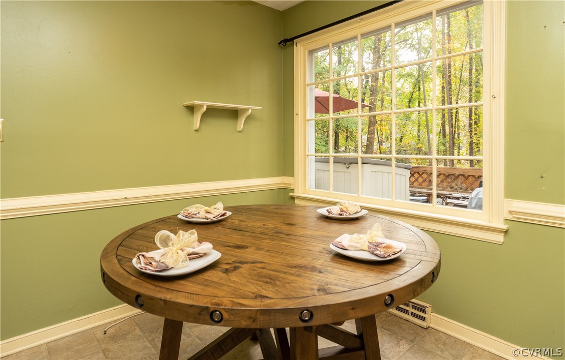 4624 Rabbit Foot Lane Chesterfield, VA 23236 - Photo 10 of 27 a view of a dining table and chairs in the floor