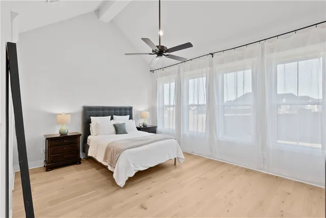 a view of cabinets a sink and wooden floor