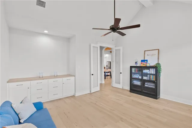 a living room with furniture and a window